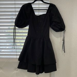 Only worn once, super cute black fluffy dress with corset back